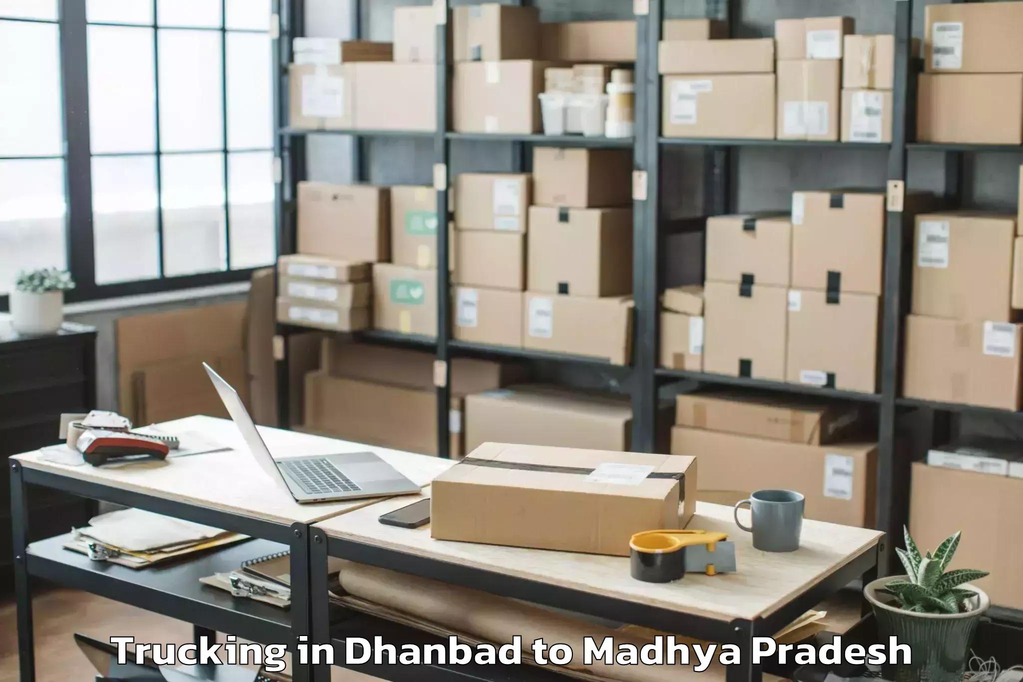 Book Dhanbad to Barnagar Pt Trucking Online